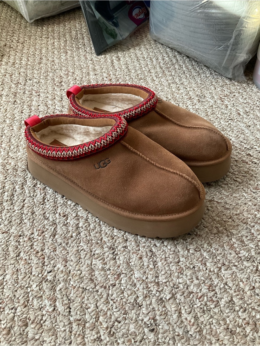 UGG Women’s Chestnut Suede Slip-On Shearling Clog with Red Trim